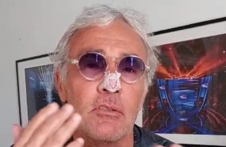 Massimo Giletti polso fasciato