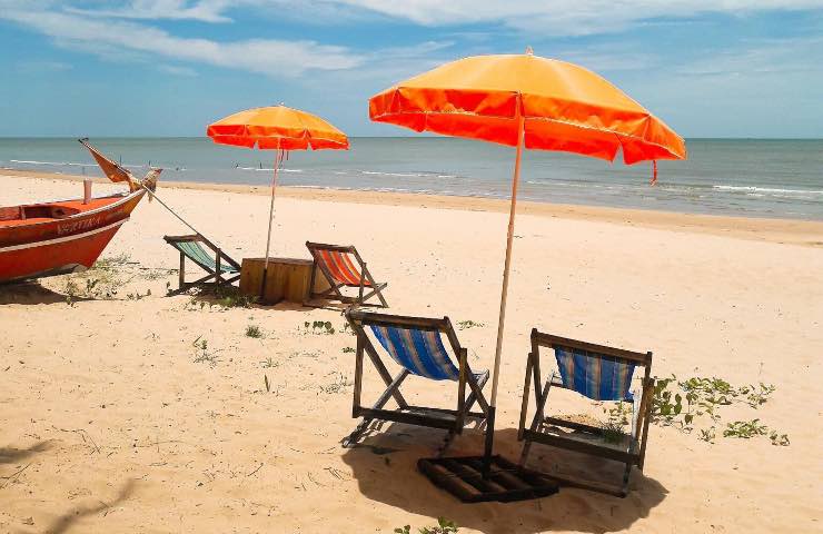 ombrellone spiaggia viola legge