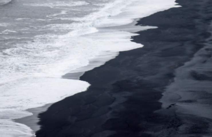 Spiaggia nera di Punalu'u Hawaii